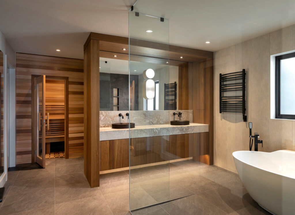 Wood bathroom with sauna and glass divider