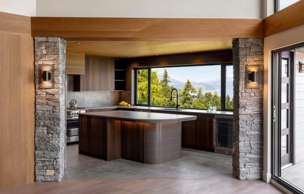 rounded kitchen island overlooking natural view